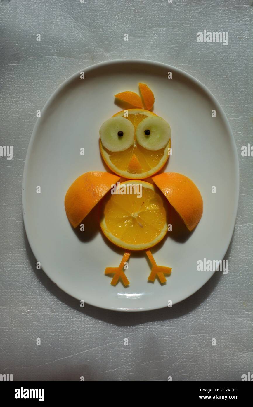Oiseau imaginaire fait avec Orange Banque D'Images