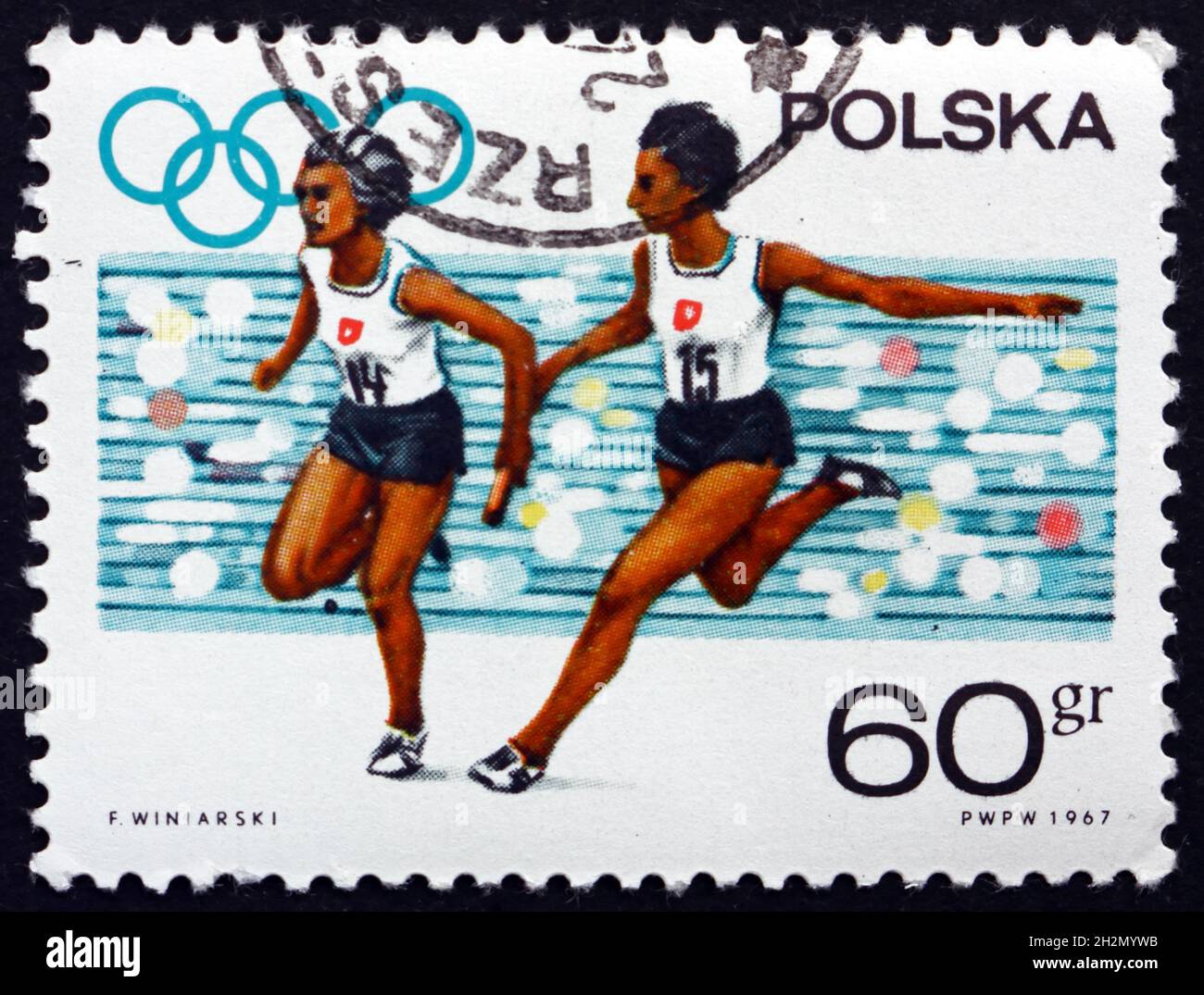 POLOGNE - VERS 1967 : un timbre imprimé en Pologne montre la course de relais des femmes, 19e Jeux Olympiques, Mexico, vers 1967 Banque D'Images