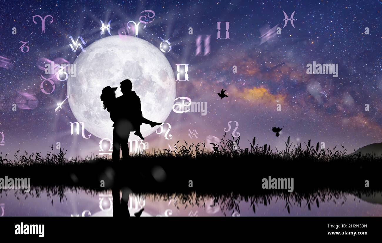 Signes astrologiques du zodiaque à l'intérieur du cercle de l'horoscope.Couple ou Lover sur la roue du zodiaque et l'arrière-plan de la voie laiteuse.La puissance de l'univers concep Banque D'Images