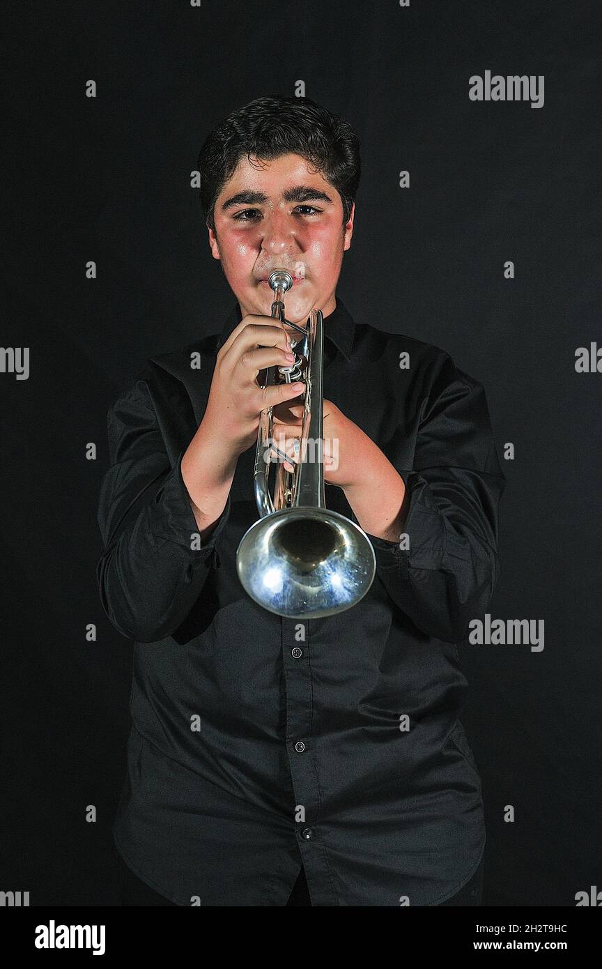 Les étudiants du Conservatoire de musique répétitions dans la salle de classe. Banque D'Images