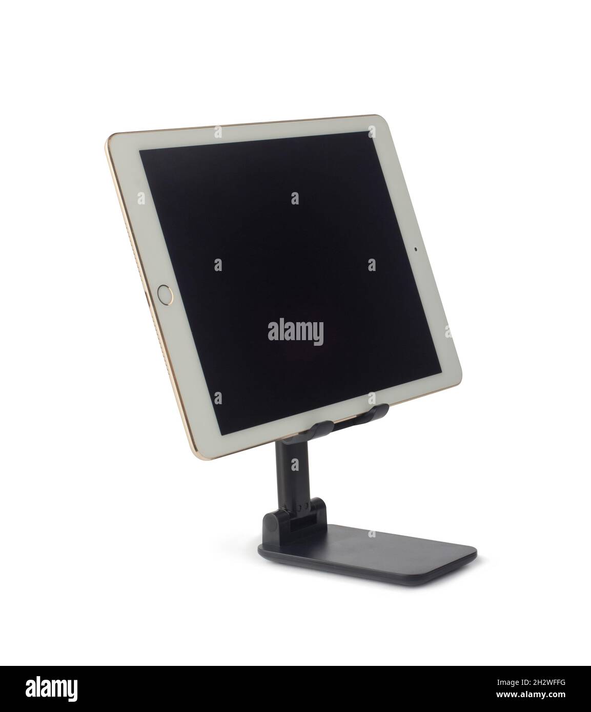 Tablette avec écran vierge sur support isolé sur fond blanc Banque D'Images