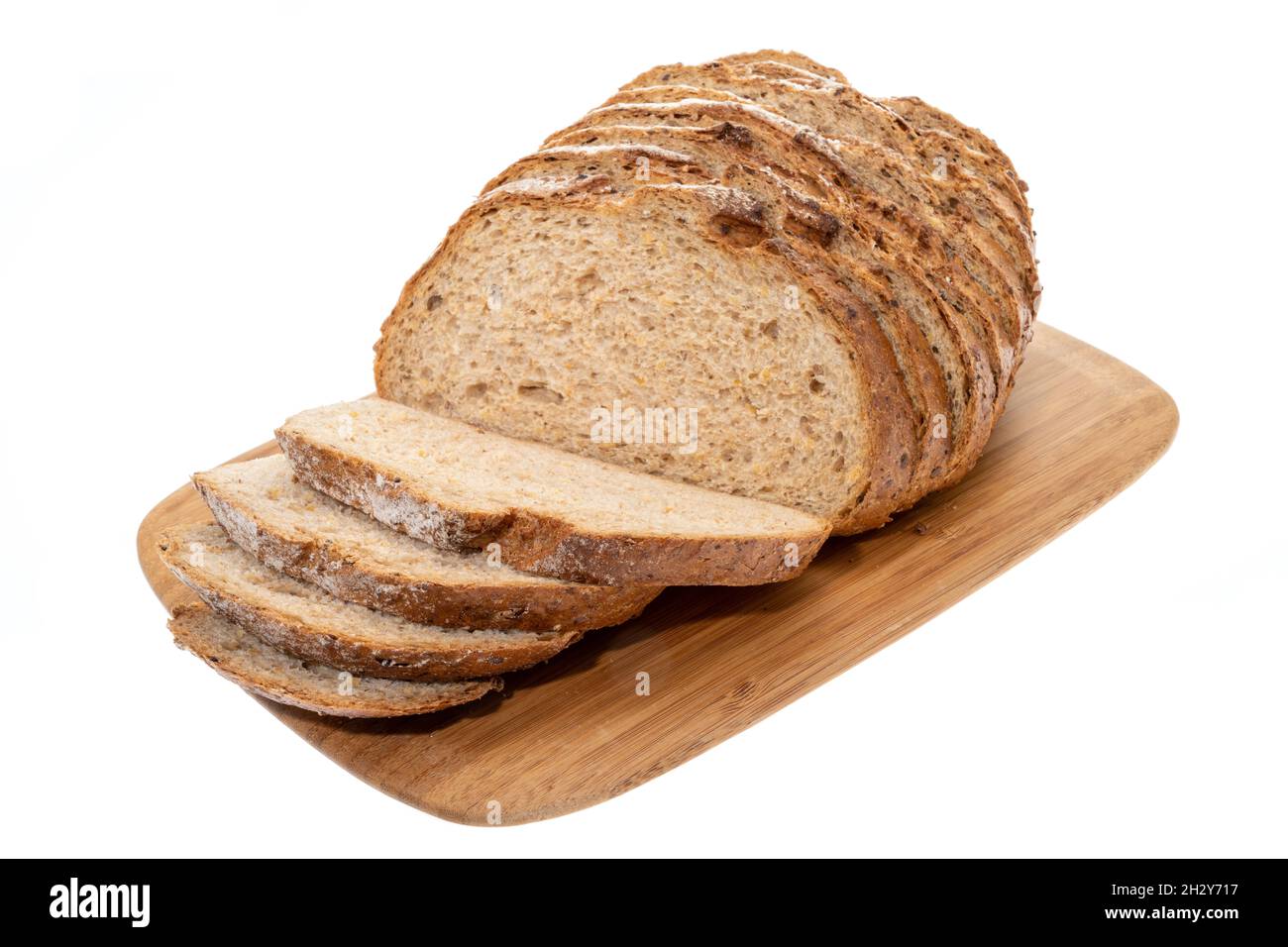 Un pain coupé en tranches de pain d'épeautre - fond blanc Photo Stock -  Alamy