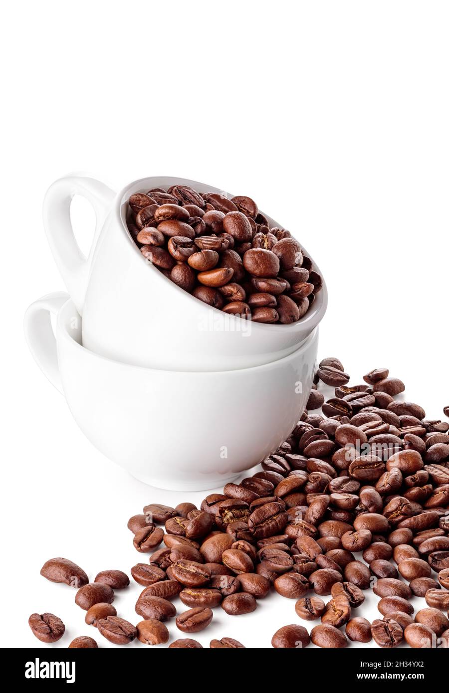 Deux tasses blanches avec grains de café Banque D'Images