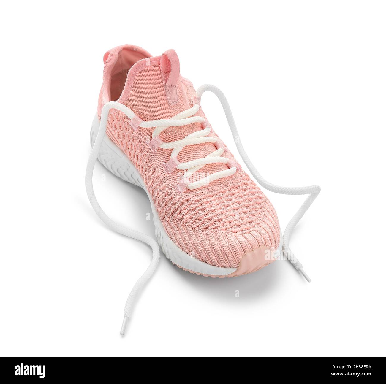 Chaussure rose avec dentelle dénouée sur fond blanc Photo Stock - Alamy