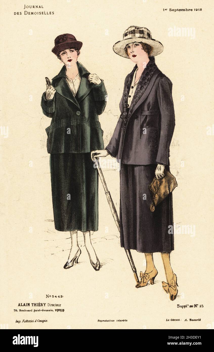 Deux femmes à la mode lors d'une promenade d'automne, WWI..En costume en  laine avec ceinture en deux pièces, chapeaux à large bord, avec sac à main,  bâton de marche et gants.Lithographie de
