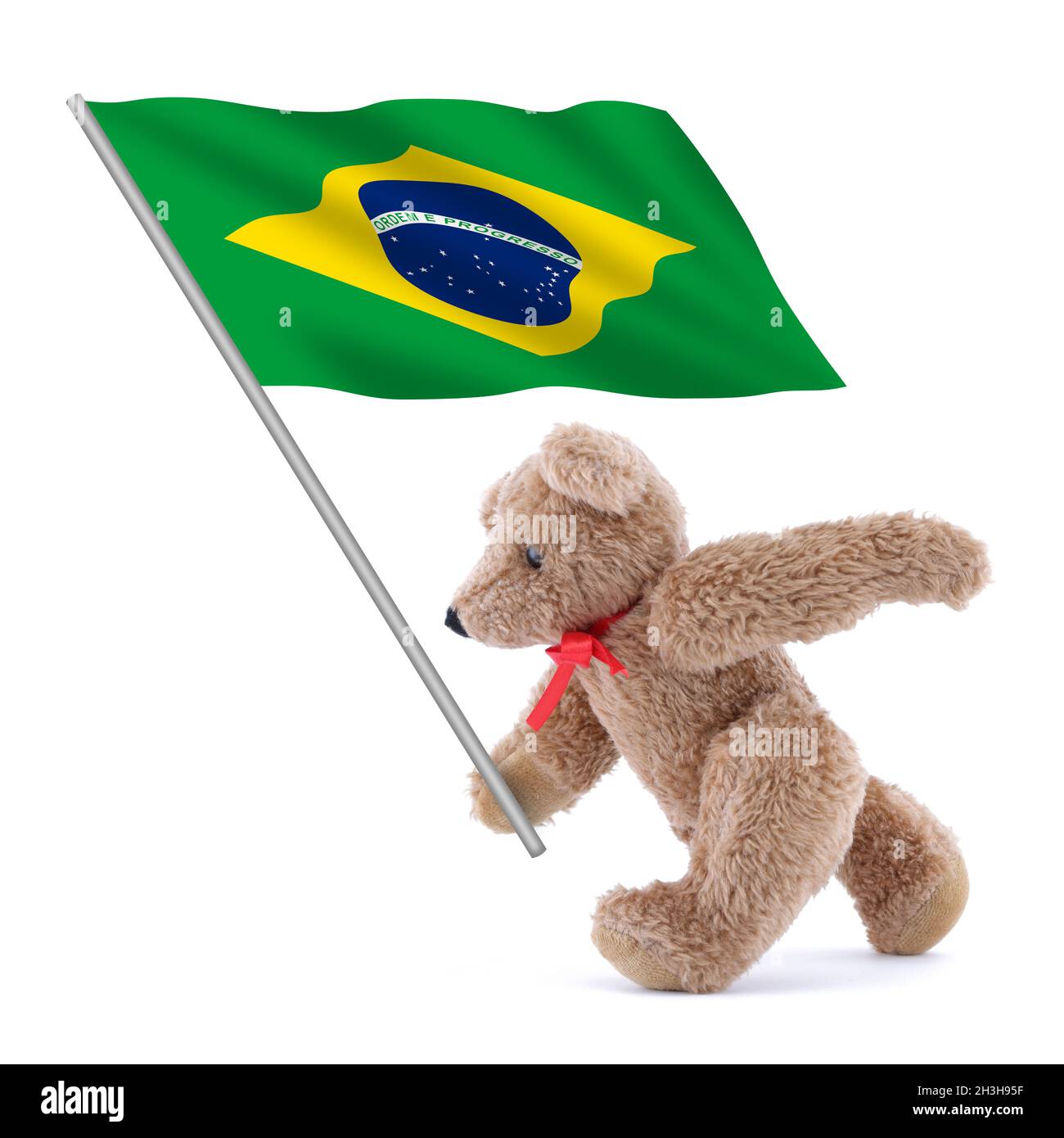 Drapeau brésilien porté par un adorable ours en peluche Banque D'Images