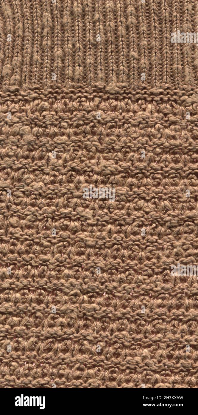 Texture de tissu brun de laine ou arrière-plan abstrait.Tissu tissé bordeaux confortable en angora. Banque D'Images