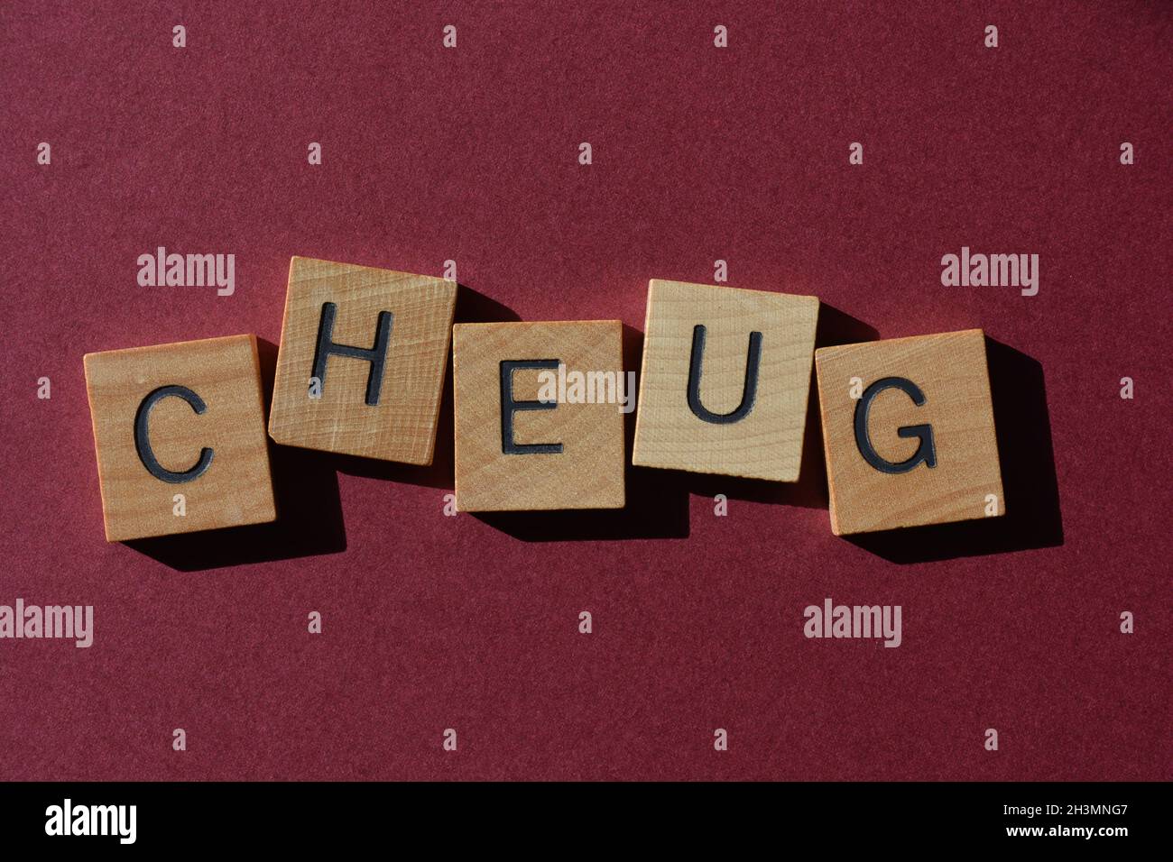 Cheug, mot en lettres de l'alphabet de bois, popularisé par la génération Z, pour décrire une personne avec des tendances de style de vie associées à la génération du millénaire, l'opp Banque D'Images