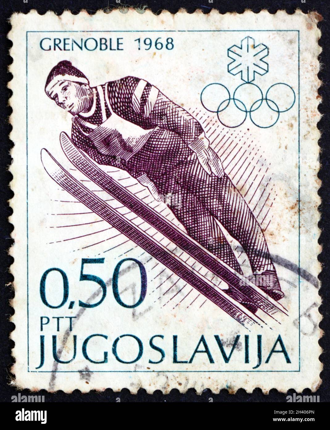 YOUGOSLAVIE - VERS 1968 : un timbre imprimé en Yougoslavie montre le saut à ski, 10e Jeux Olympiques d'hiver, Grenoble, France, vers 1968 Banque D'Images