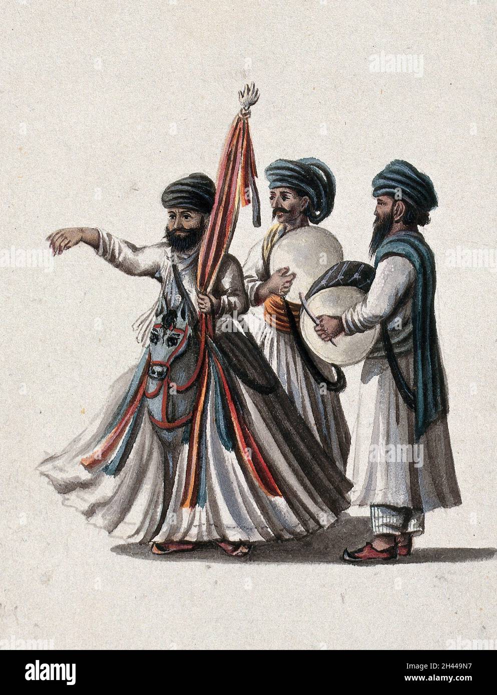 Un interprète de rue accompagné de deux musiciens.Peinture de gouache par un artiste indien. Banque D'Images