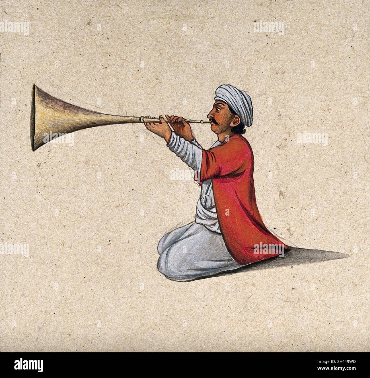 Un musicien indien jouant un instrument de vent en laiton.Peinture de gouache par un artiste indien. Banque D'Images