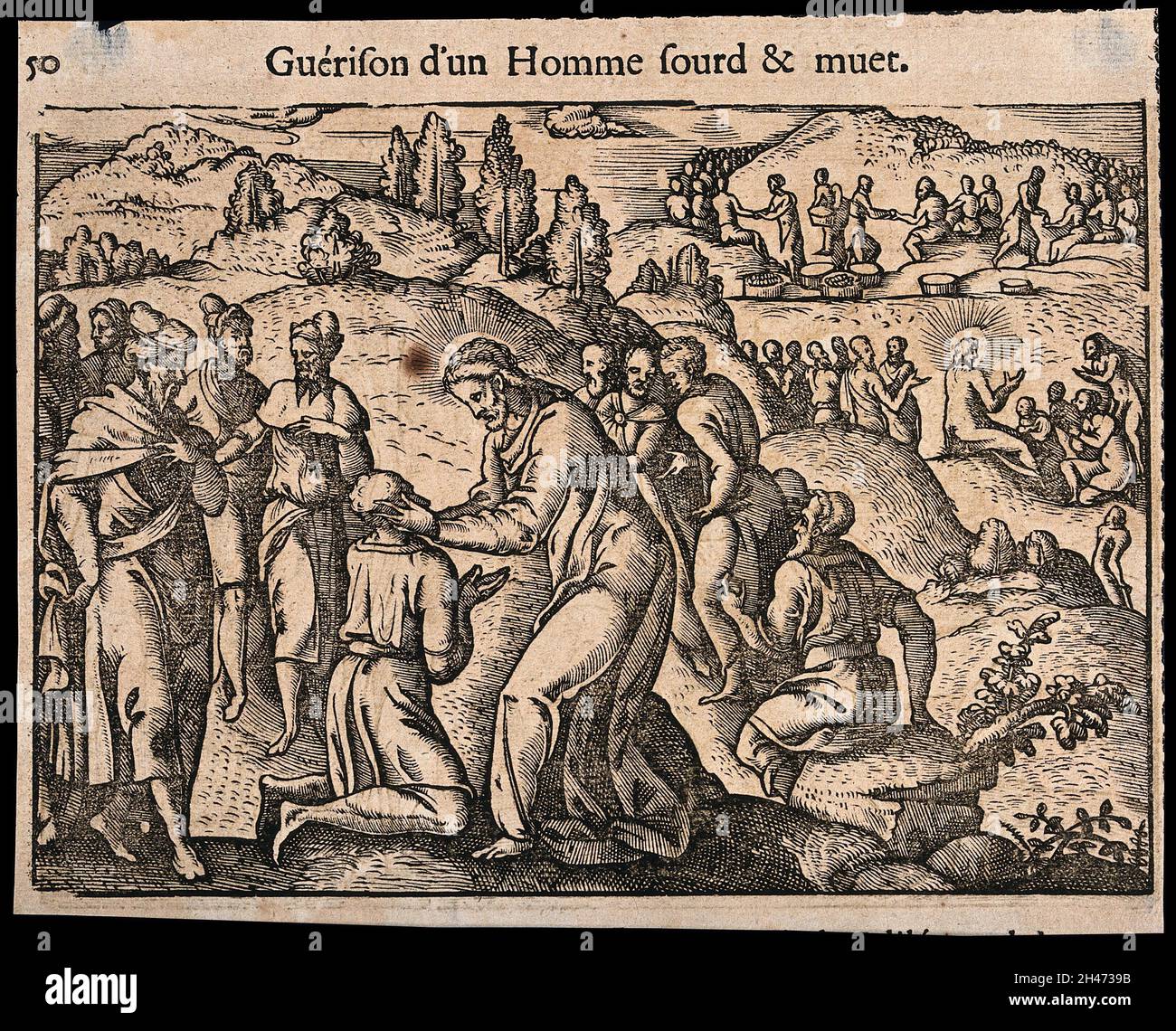 Christ guérit un sourd muet avec ses mains.Coupe de bois. Banque D'Images