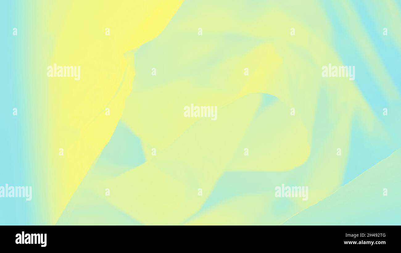 Tissu volant couleur bleu et jaune vif, 16 sur 9 arrière-plan flou abstrait Banque D'Images