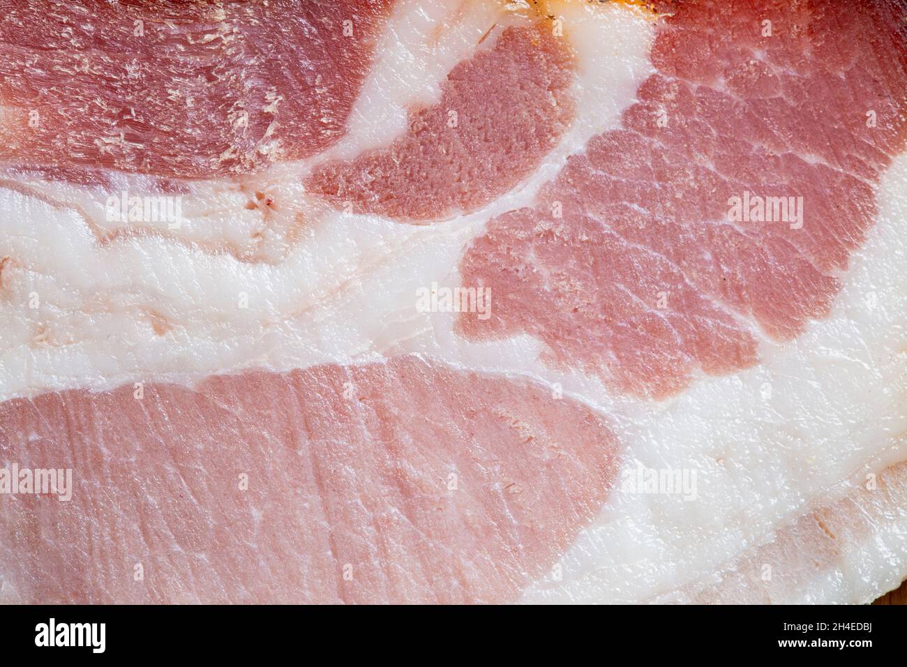photo macro d'une tranche de bacon, texture de la viande de porc Banque D'Images