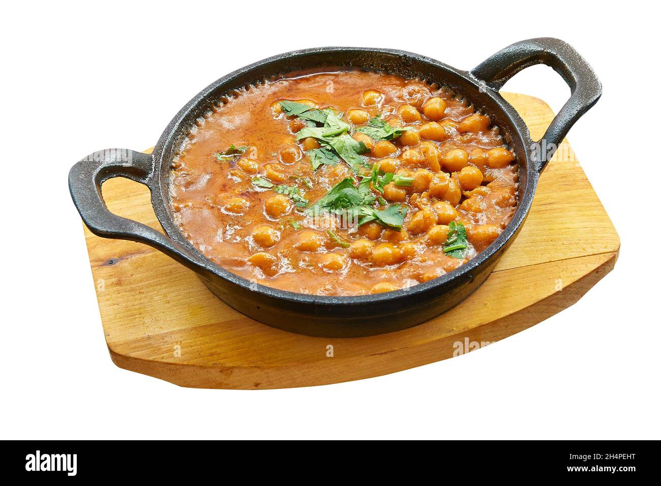 Vue aérienne du masala dans une petite casserole.Isolé sur blanc avec un masque Banque D'Images