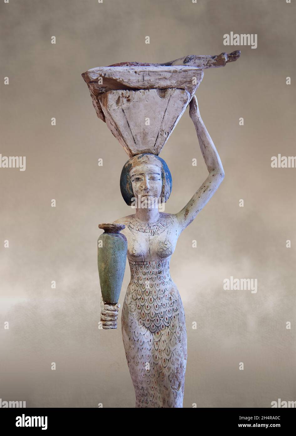 Egyptien Wood Sculpture d'une femelle portant offrandes, 1963-1862 av. J.-C., départ 12ème duynasty, bois.Musée du Louvre inv E10781.La statue représente une femme Banque D'Images
