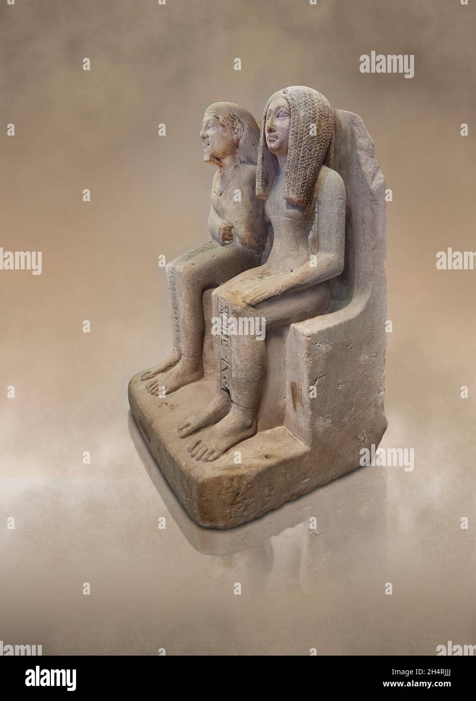 Statue égyptienne Djehoutynefer, scribe d'Amon et sa femme Benemeb, 1479-1457 av. J.-C., 18e dynastie.Musée du Louvre inv A55 ou N 56.Femme (siège Banque D'Images