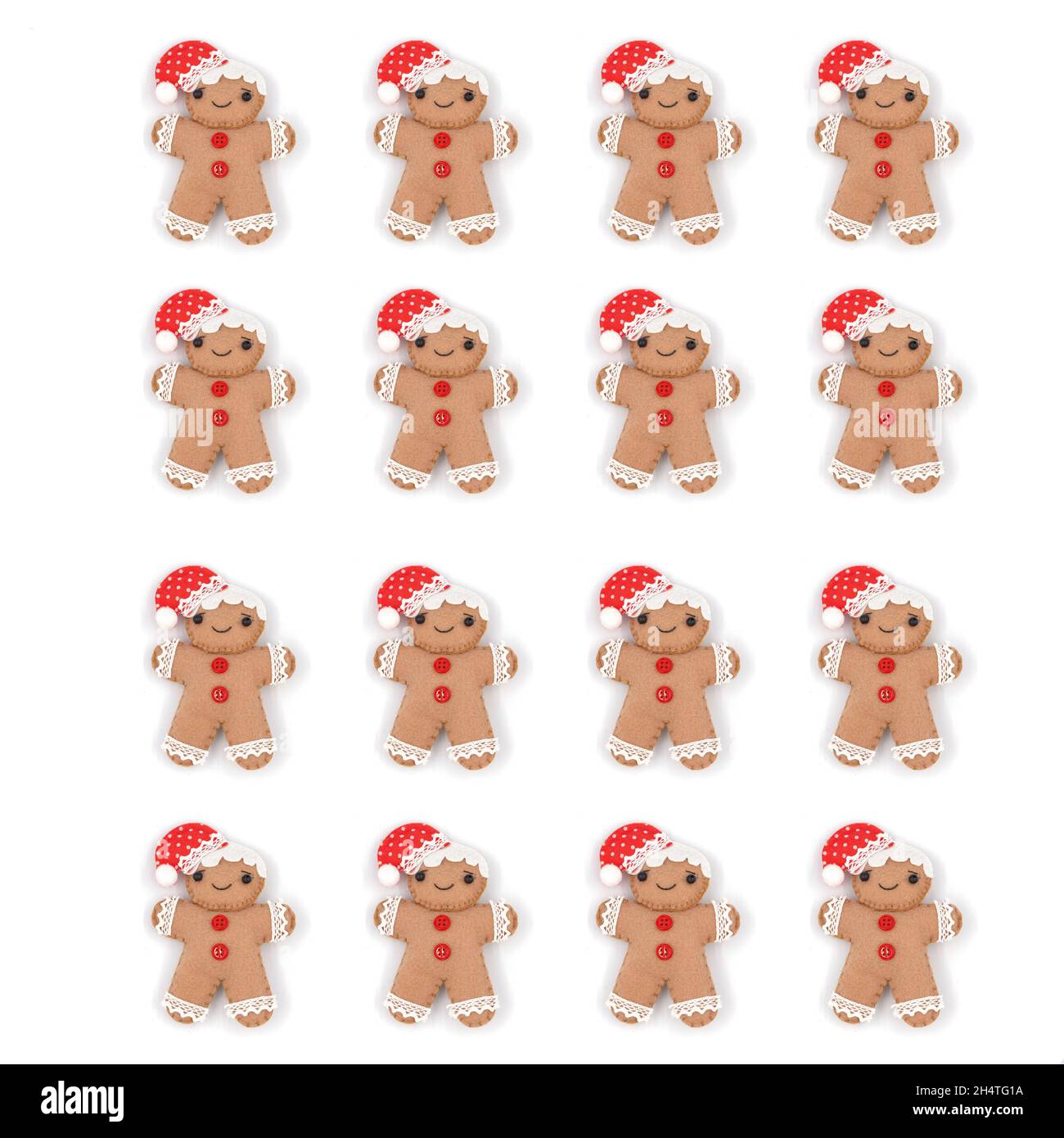 Concept de la nouvelle année.Motif tendance créé par un homme avec un pain d'épice de Noël sur fond blanc.Concept créatif minimal.Noël créatif en déc Banque D'Images