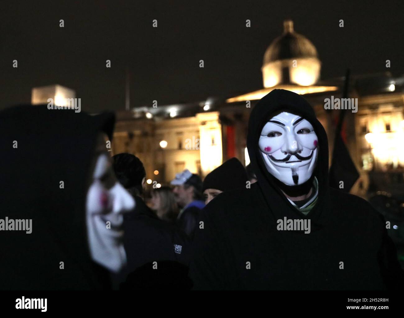 Londres, Royaume-Uni.Vendredi 5 novembre 2021.Des manifestants masqués lors de la marche du million Mask à la place Trafalgar à Londres, en Angleterre.Crédit photo: Isabel Infantes/Alay Live News Banque D'Images