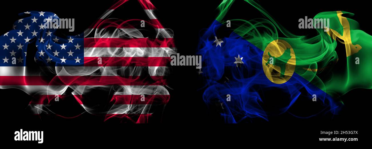 États-Unis d'Amérique contre l'Australie, l'Australie, les drapeaux de fumée de l'île Christmas placés côte à côte Banque D'Images