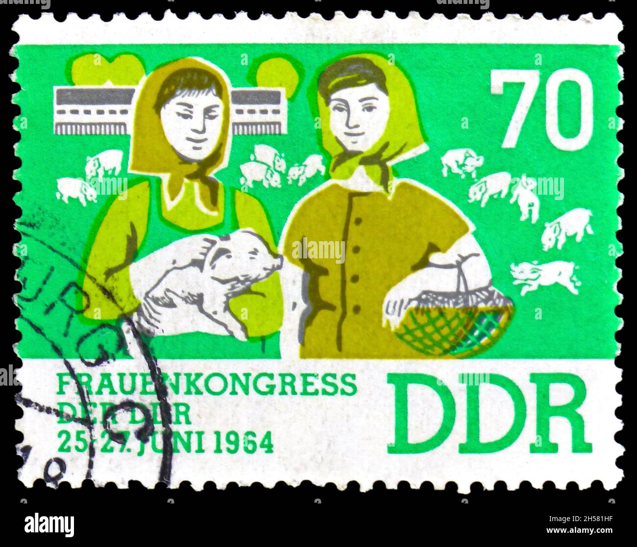 MOSCOU, RUSSIE - 24 OCTOBRE 2021: Timbre-poste imprimé en Allemagne montre éleveur de bovins, série du Congrès des femmes, vers 1964 Banque D'Images