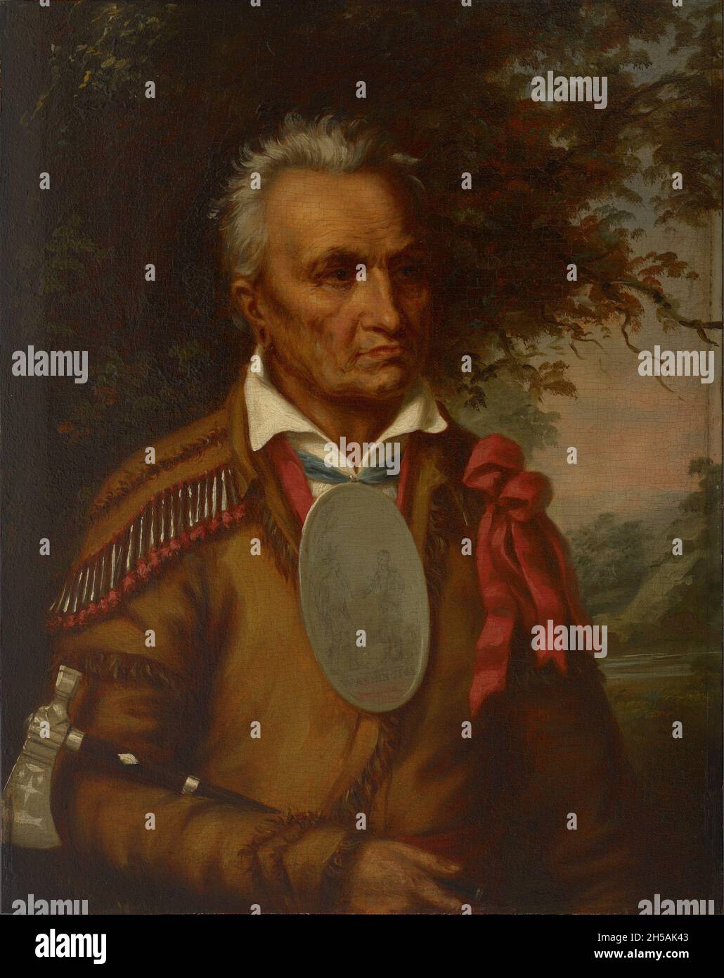 Red-Jacket Un chef de guerre Seneca [Red Jacket (connu sous le nom d'Otetiani dans sa jeunesse et Sagoyewatha [Keeper Awake] sa-Go-ye-wa-tha comme un adulte en raison de ses compétences oratoires) (c.1750–20 janvier 1830) était un orateur Seneca et chef du clan Wolf, basé à l'ouest de New York au nom de sa nation, il a négocié avec les nouveaux États-Unis après la guerre d'indépendance américaine,Lorsque les Seneca, alliés britanniques, ont été contraints de céder beaucoup de terres après la défaite des Britanniques, il a signé le Traité de Canandaigua (1794).Il a contribué à la sécurité de certains territoires de Seneca dans l'État de New York, bien que la plupart de son peop Banque D'Images