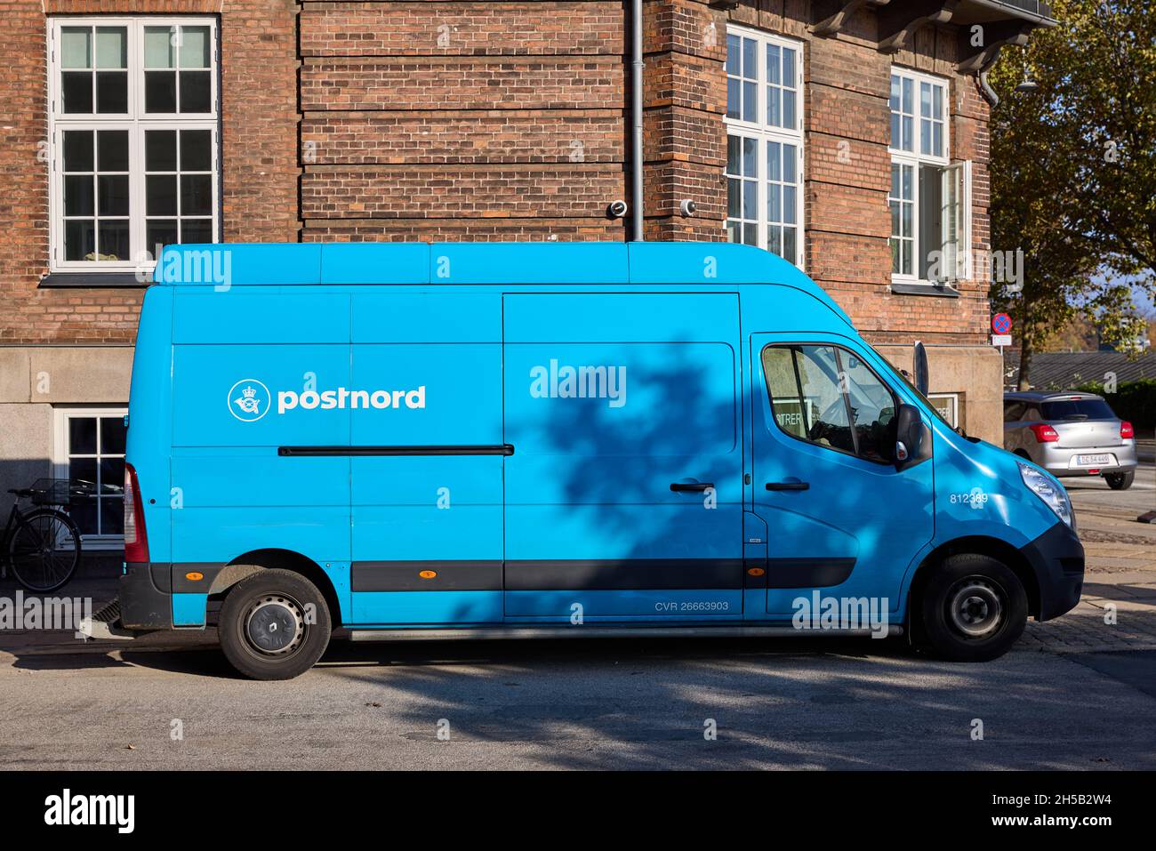 Postnord car (voiture de livraison postale), Copenhague, Danemark Banque D'Images