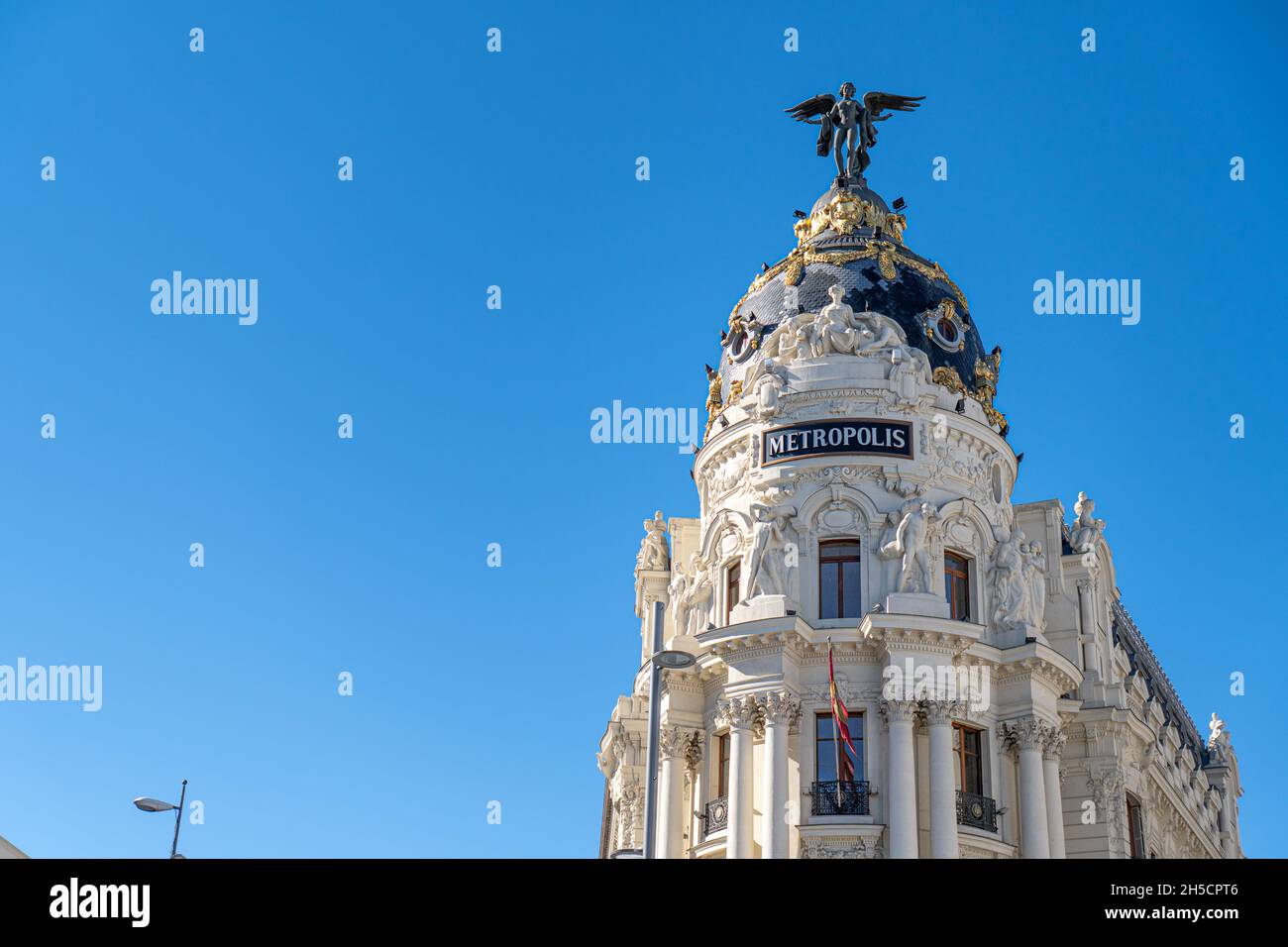 Metropolis bâtiment à Madrid près de Gran V A. Banque D'Images