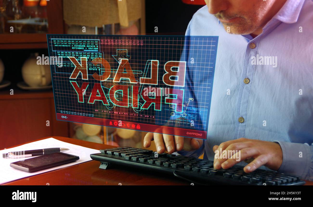 Vendredi noir sur l'écran de l'ordinateur.Grande vente, offre spéciale, shopping et offre spéciale concept 3d abstrait avec effet de glitch.Homme tapant le clavier. Banque D'Images