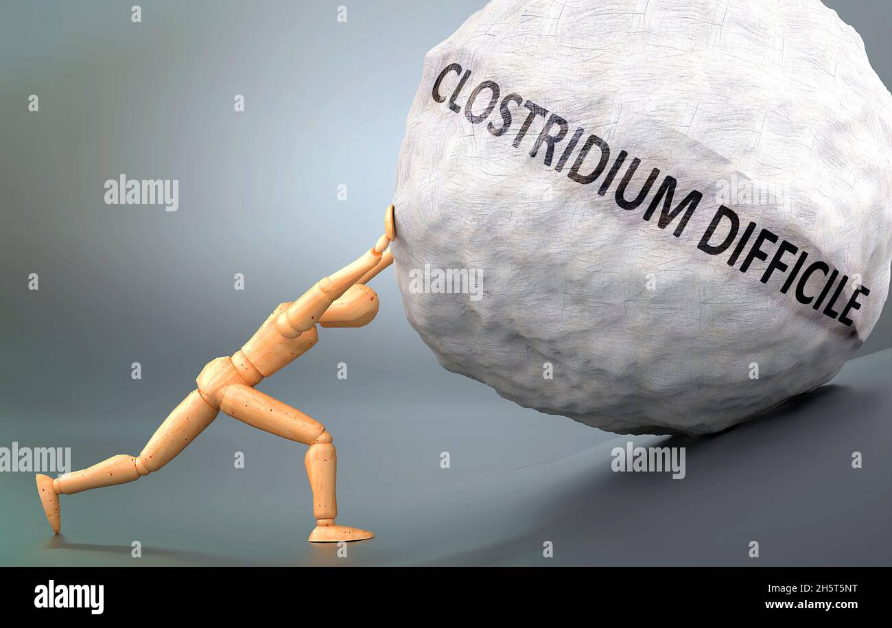 La représentation de Clostridium difficile a montré un modèle en bois poussant le poids lourd pour symboliser la lutte et la douleur lorsqu'on a affaire à Clostridium difficile, 3 Banque D'Images
