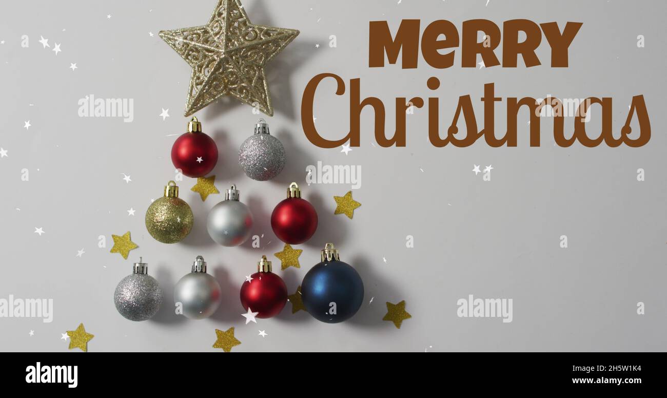 Image du texte joyeux noël sur des boules Banque D'Images