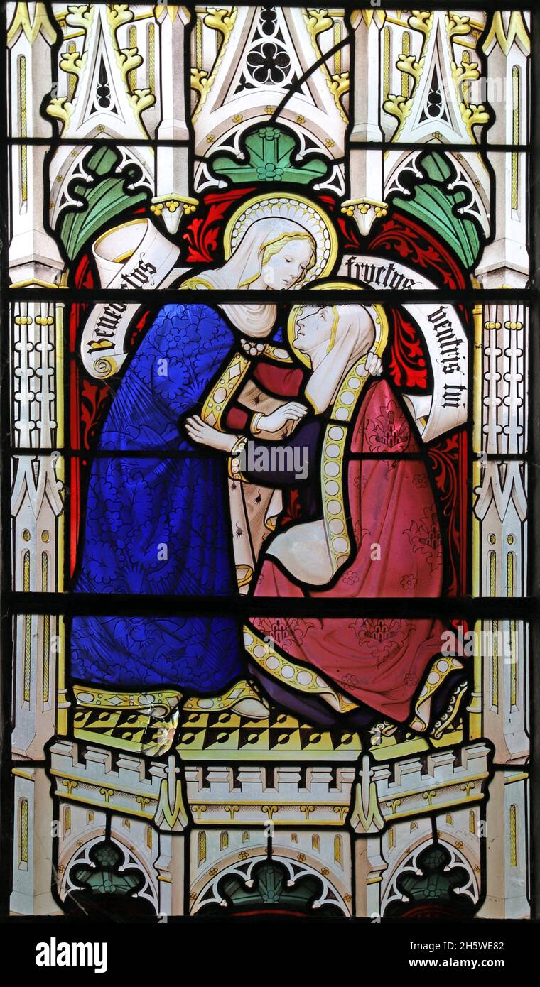 Une fenêtre en vitraux de Christpher Webb représentant la Sainte-Elizabeth saluant la Vierge Marie, l'église St Swithun, le Quinton inférieur, Warwickshire Banque D'Images