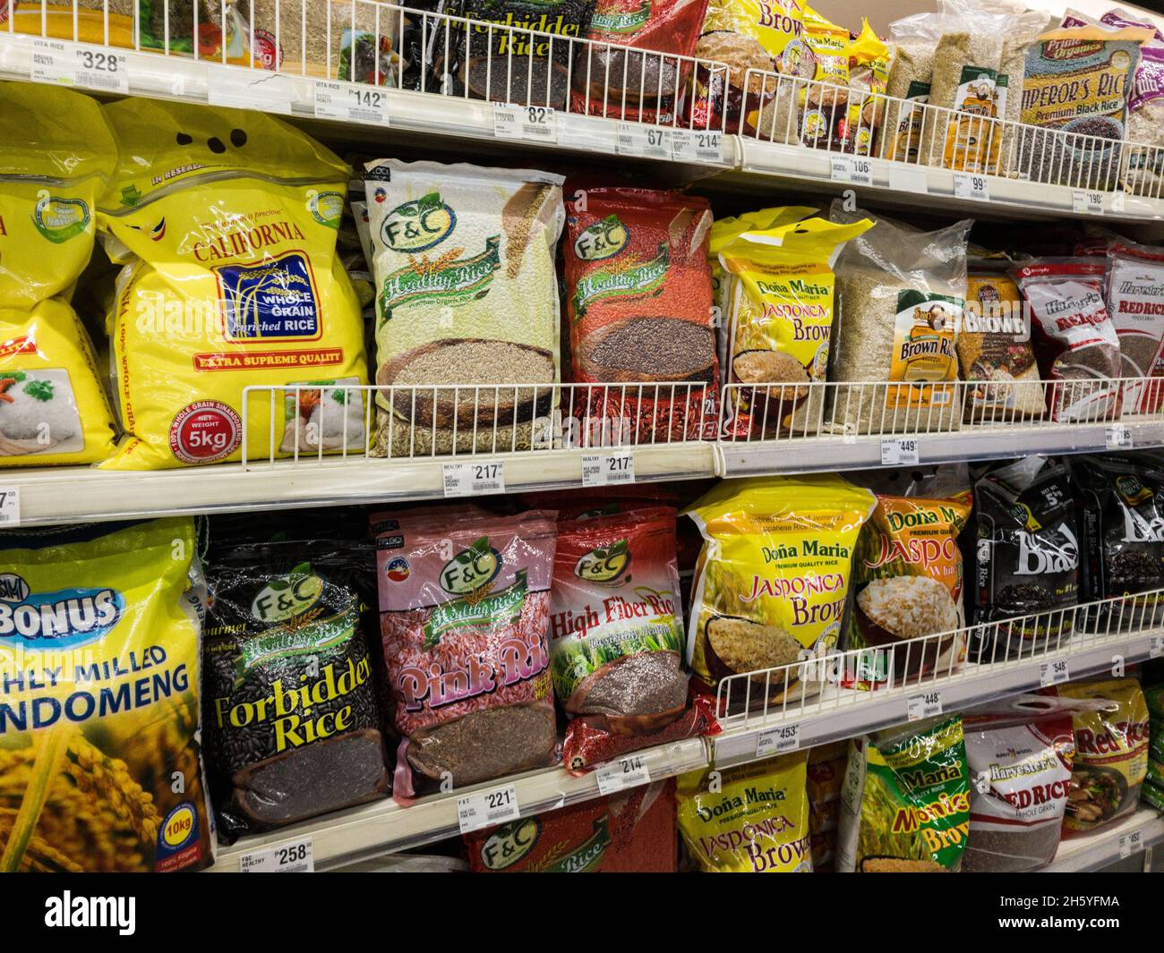 Juillet 2017.La marque « Farms and Cottages » fait partie de la coopérative de développement durable de la Fédération des peuples (FPSDC) et la distribue.Taguig City, Grand Manille, Philippines. Banque D'Images