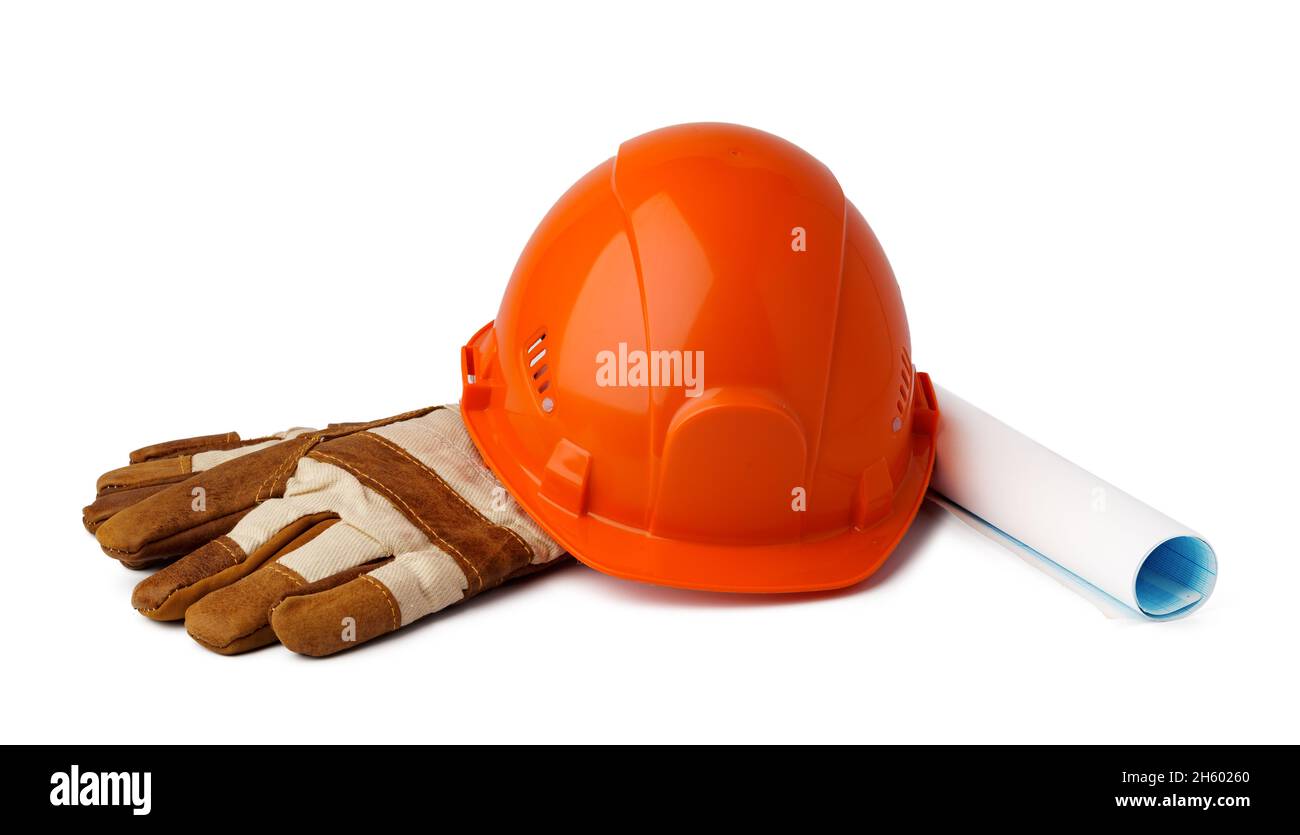 Casque de sécurité et gants de travail isolés sur fond blanc Banque D'Images