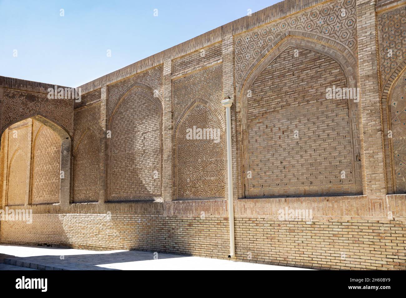 Brickwork avec un modèle complexe, le mur extérieur de la mosquée Kalyan, Boukhara, Ouzbékistan Banque D'Images