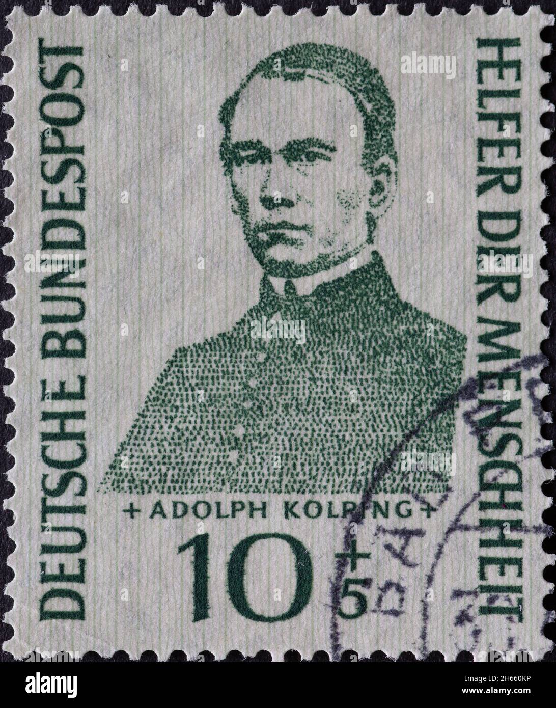 ALLEMAGNE - VERS 1955:ce timbre-poste montre le portrait du prêtre catholique Adolph Kolping né en 1813.Vers 1955 Banque D'Images
