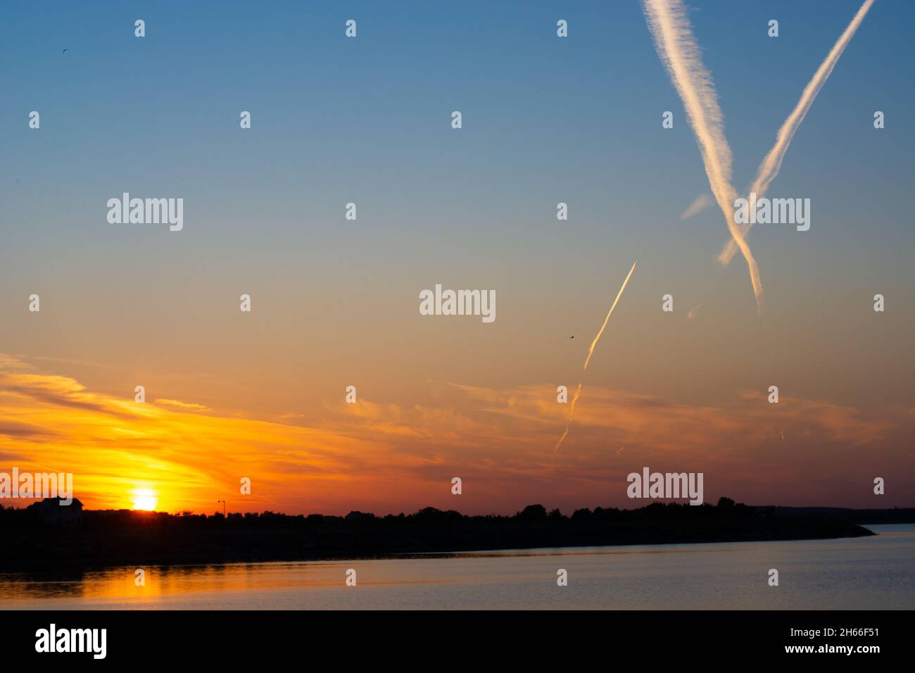 pistes d'avion au coucher du soleil Banque D'Images