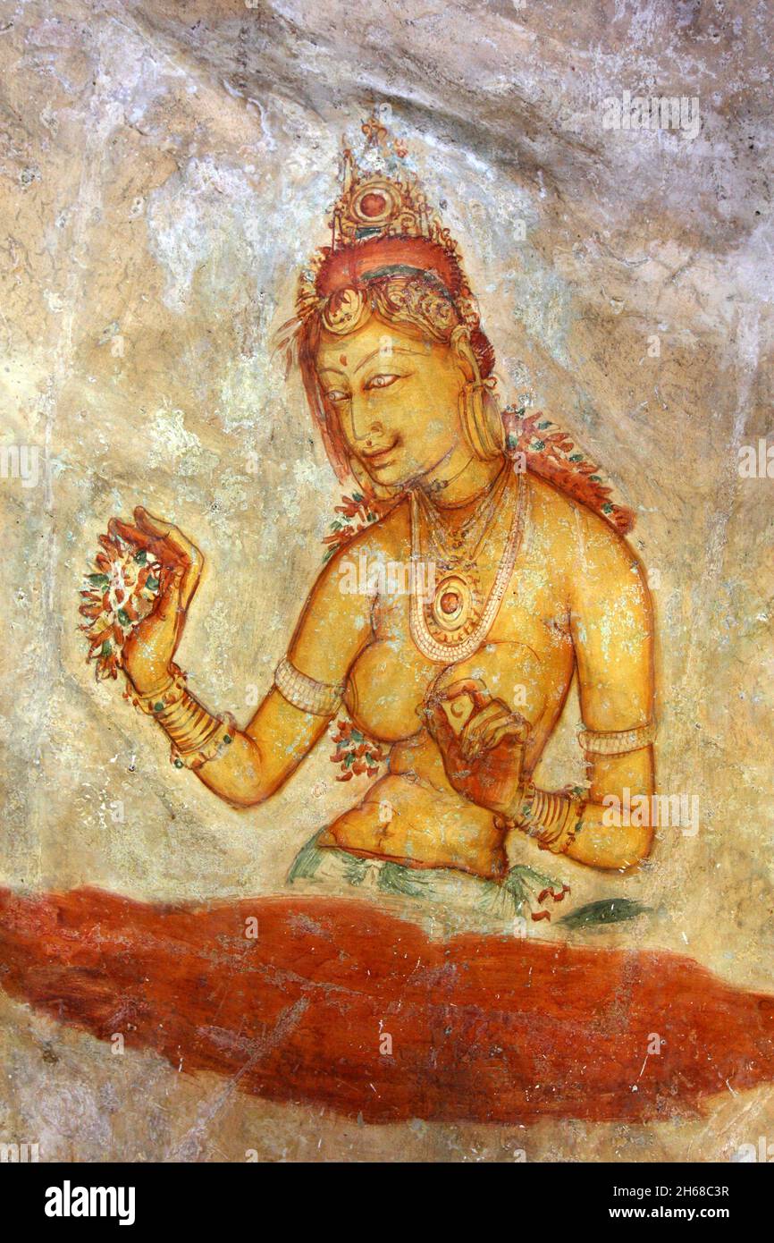 Une des magnifiques fresques d'une figure féminine datant du 5° siècle à la forteresse de Sigiriya Rock au Sri Lanka. Banque D'Images