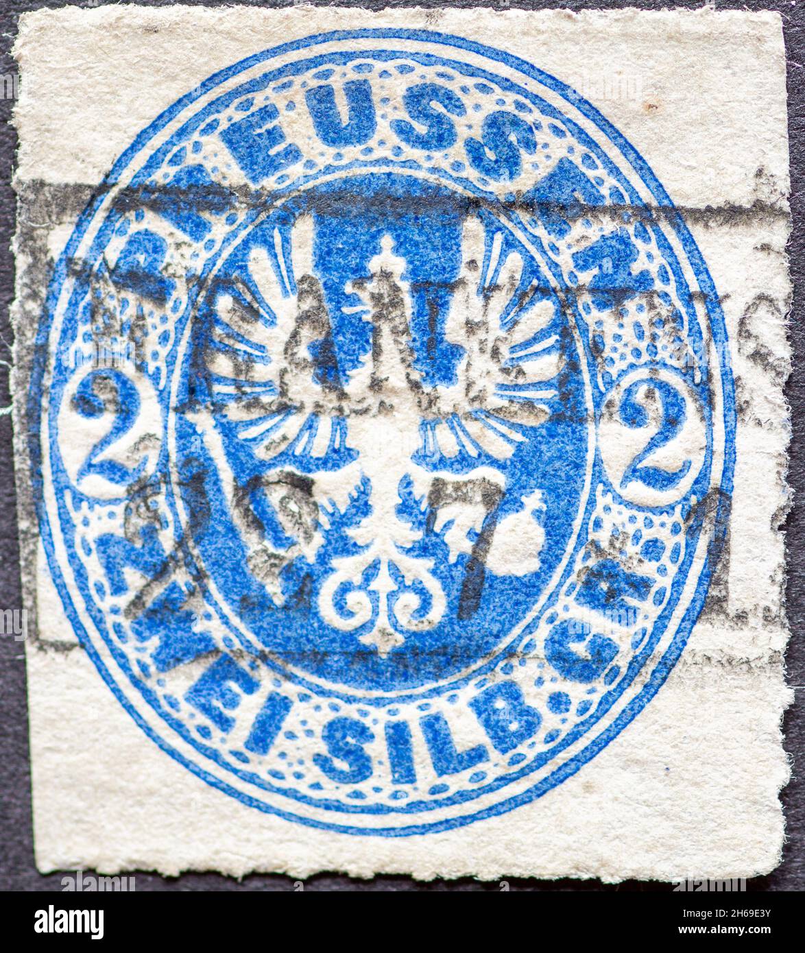 ALLEMAGNE VERS 1861 un timbreposte montre en bleu le manteau d