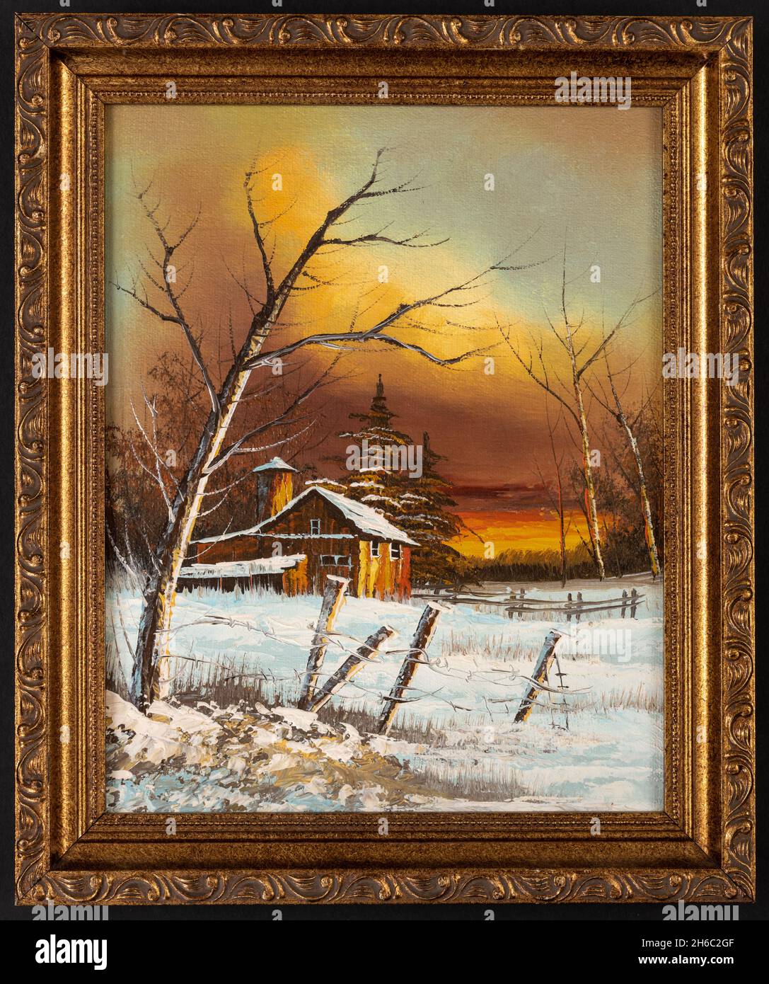 Peinture à l'huile encadrée d'une ancienne maison de grange au coucher du soleil paysage d'hiver. Concept des fêtes de Noël. Banque D'Images