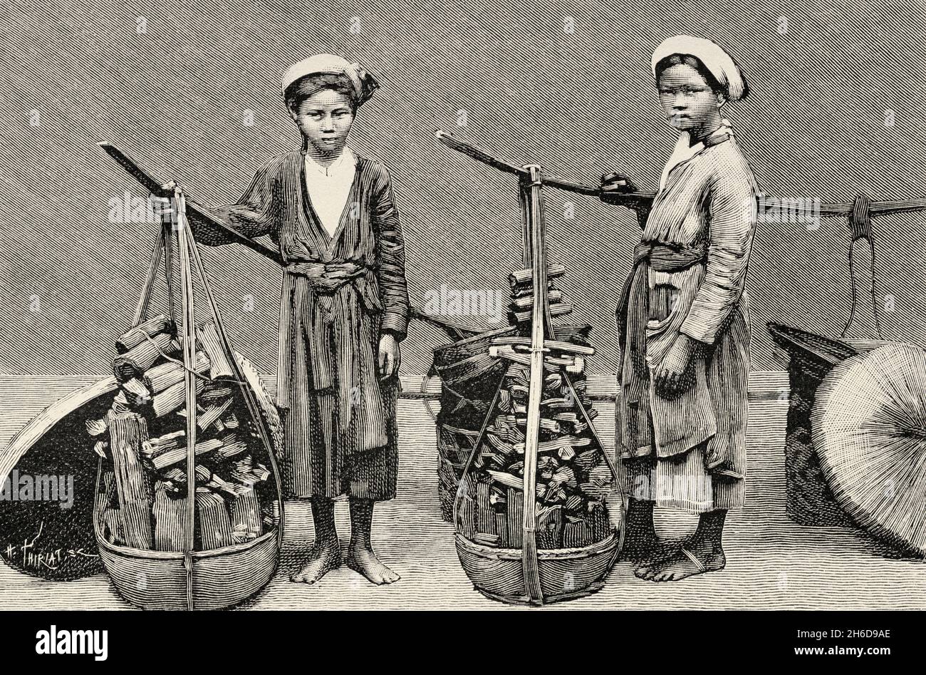 Jeunes femmes vendant du charbon de bois, Vietnam.Asie.Illustration gravée du XIXe Siècle Une campagne à Tonkin de Charles Edouard Hocquard du Tour du monde 1889 Banque D'Images