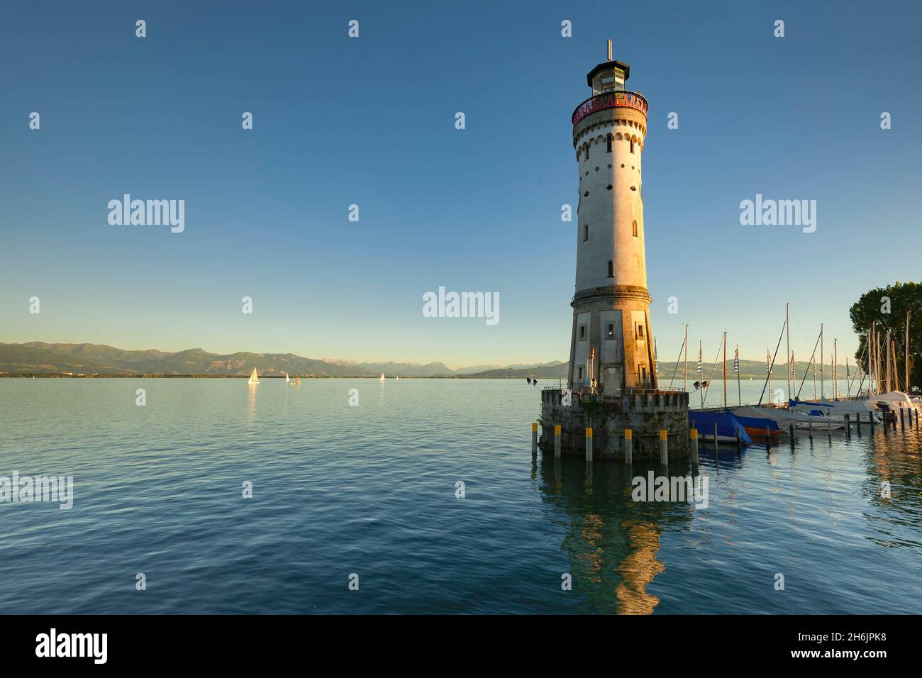 Phare au coucher du soleil, Lac de Constance, Bavière, Swabia, Allemagne,Europe Banque D'Images