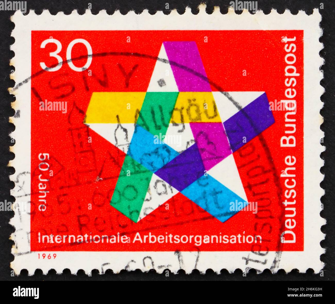 ALLEMAGNE - VERS 1969: Un timbre imprimé en Allemagne montre cinq-pointed Star, 50ème anniversaire de l'Organisation internationale du travail, vers 1969 Banque D'Images