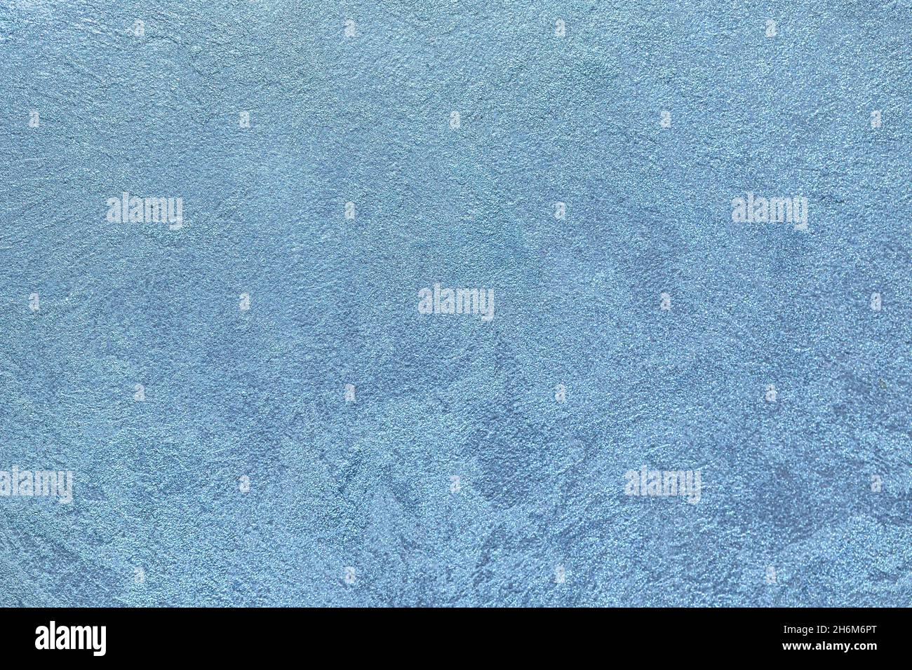 Arrière-plan bleu texturé.Murs décoratifs en plâtre, papier peint.Texture d'hiver bleue Banque D'Images