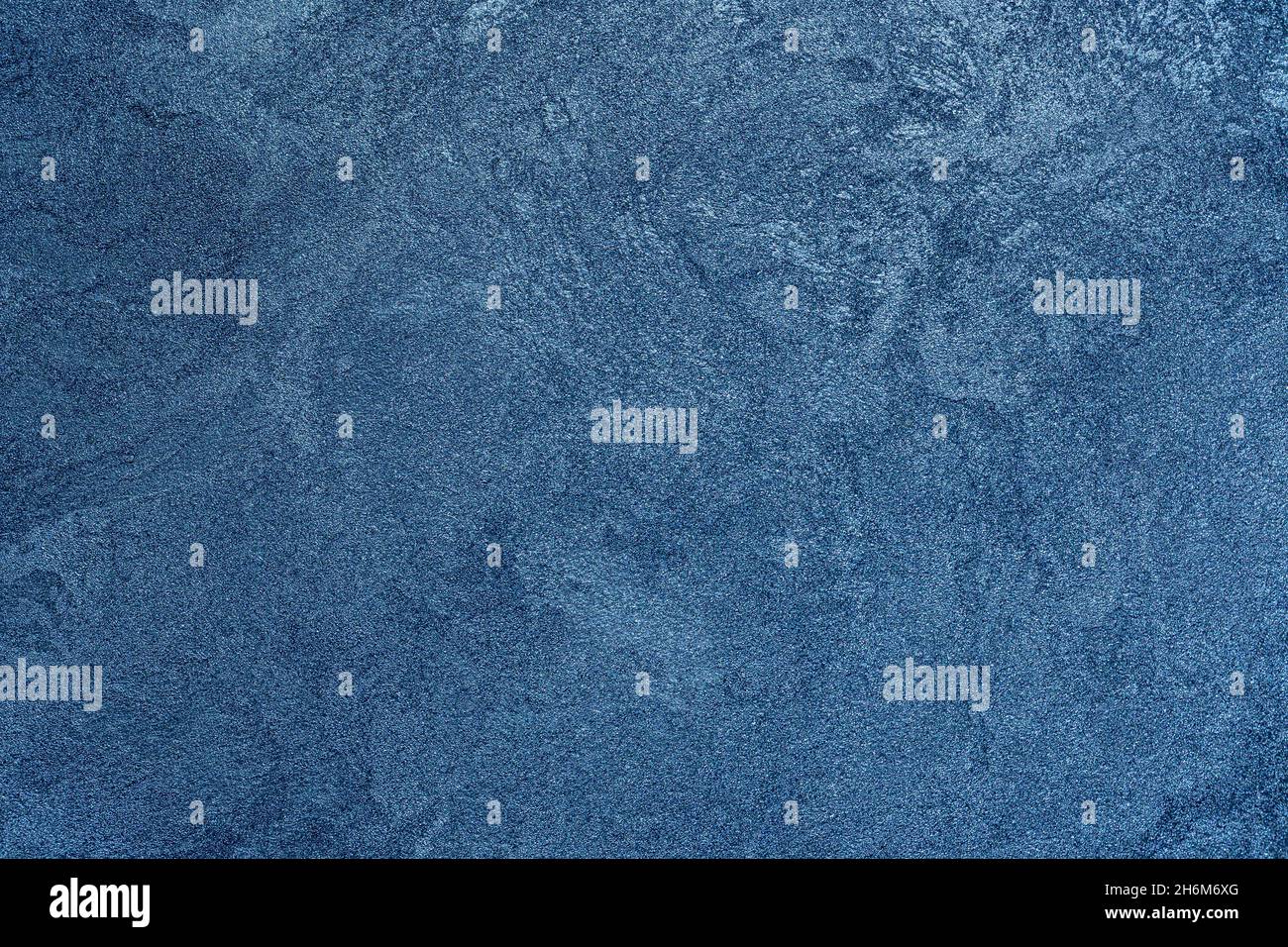 Arrière-plan bleu texturé.Murs décoratifs en plâtre, papier peint.Texture d'hiver bleue Banque D'Images