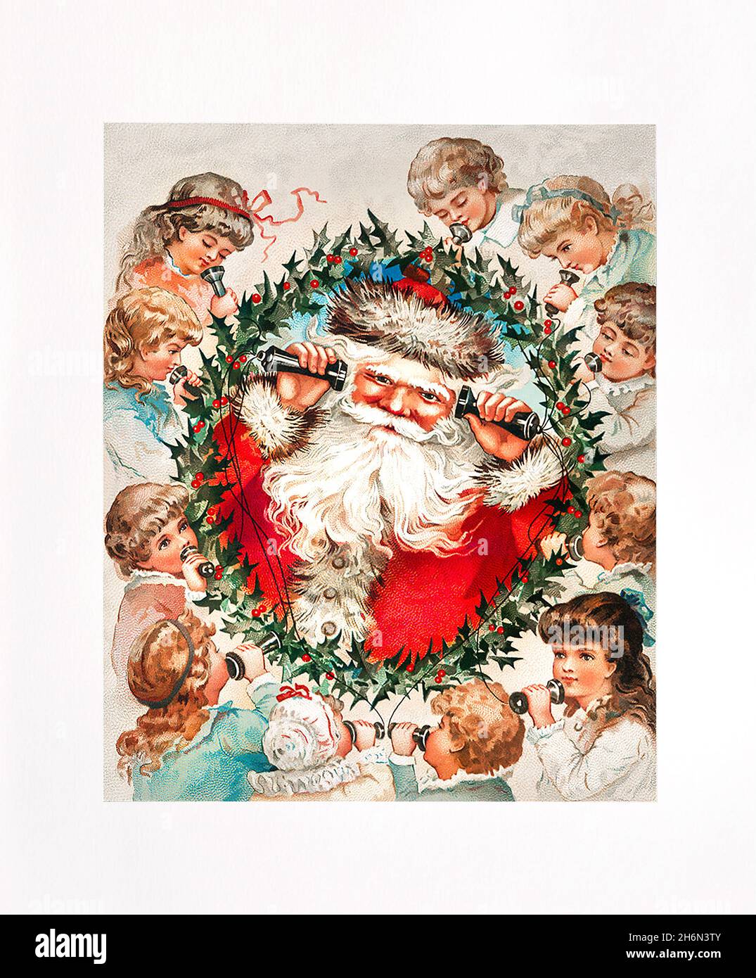 Le Père Noël appelle des enfants pour des cadeaux de Noël Banque D'Images