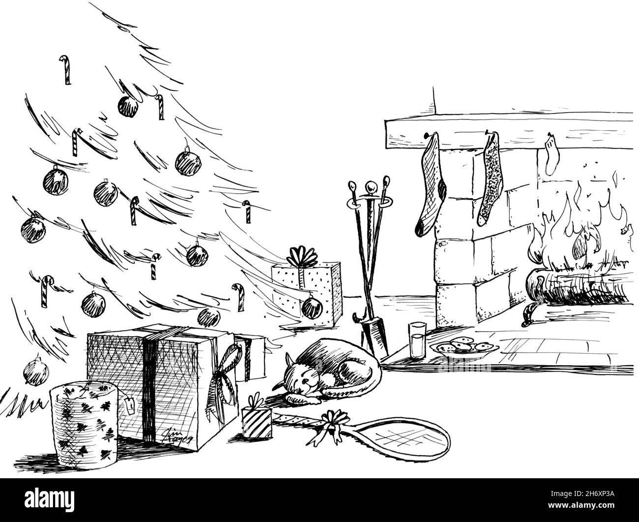 chat dormant sous l'arbre la veille de Noël Banque D'Images
