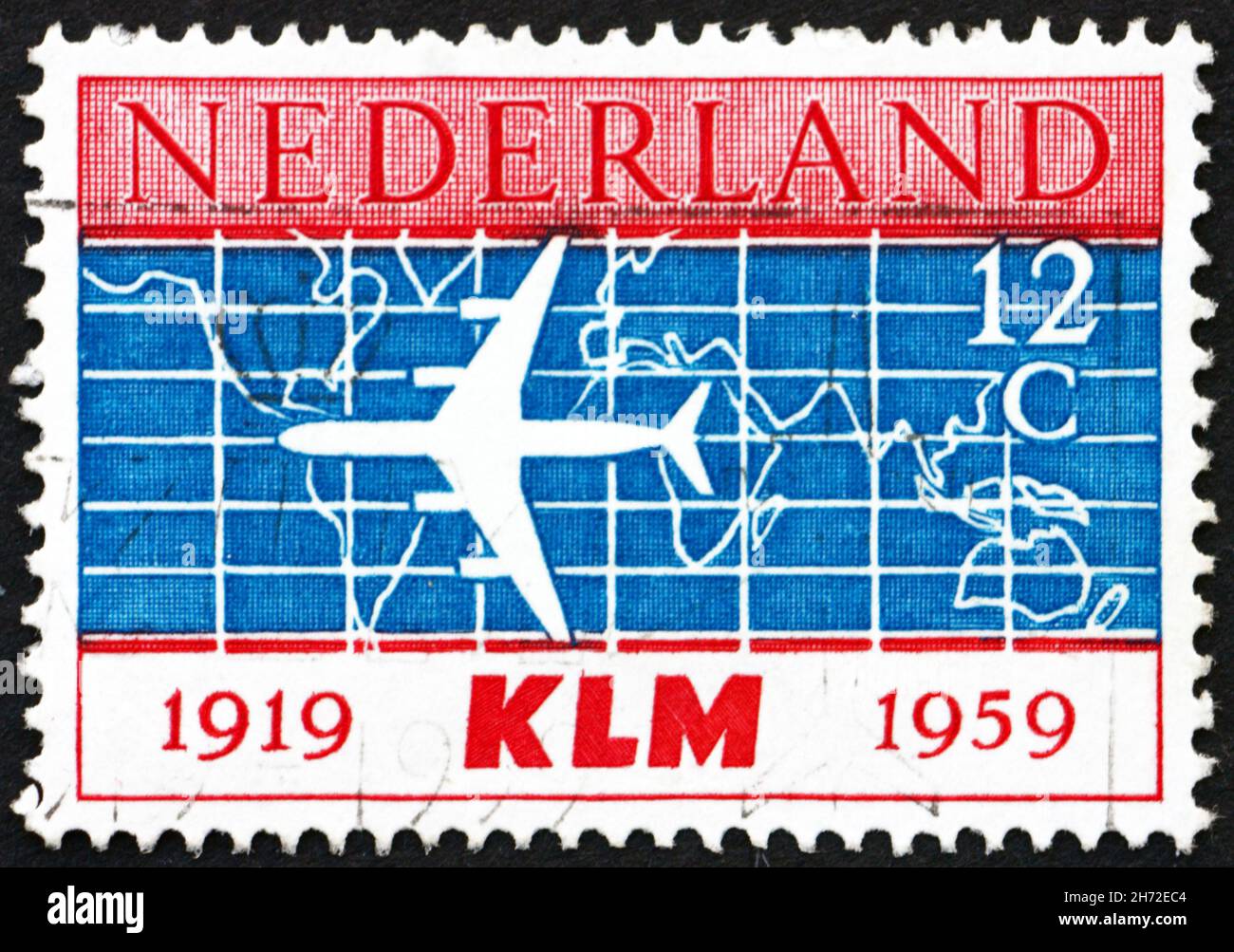 PAYS-BAS - VERS 1959 : un timbre imprimé aux pays-Bas montre Douglas DC-8 et la carte du monde, 40e anniversaire de la fondation de KLM, Royal Dutch ai Banque D'Images