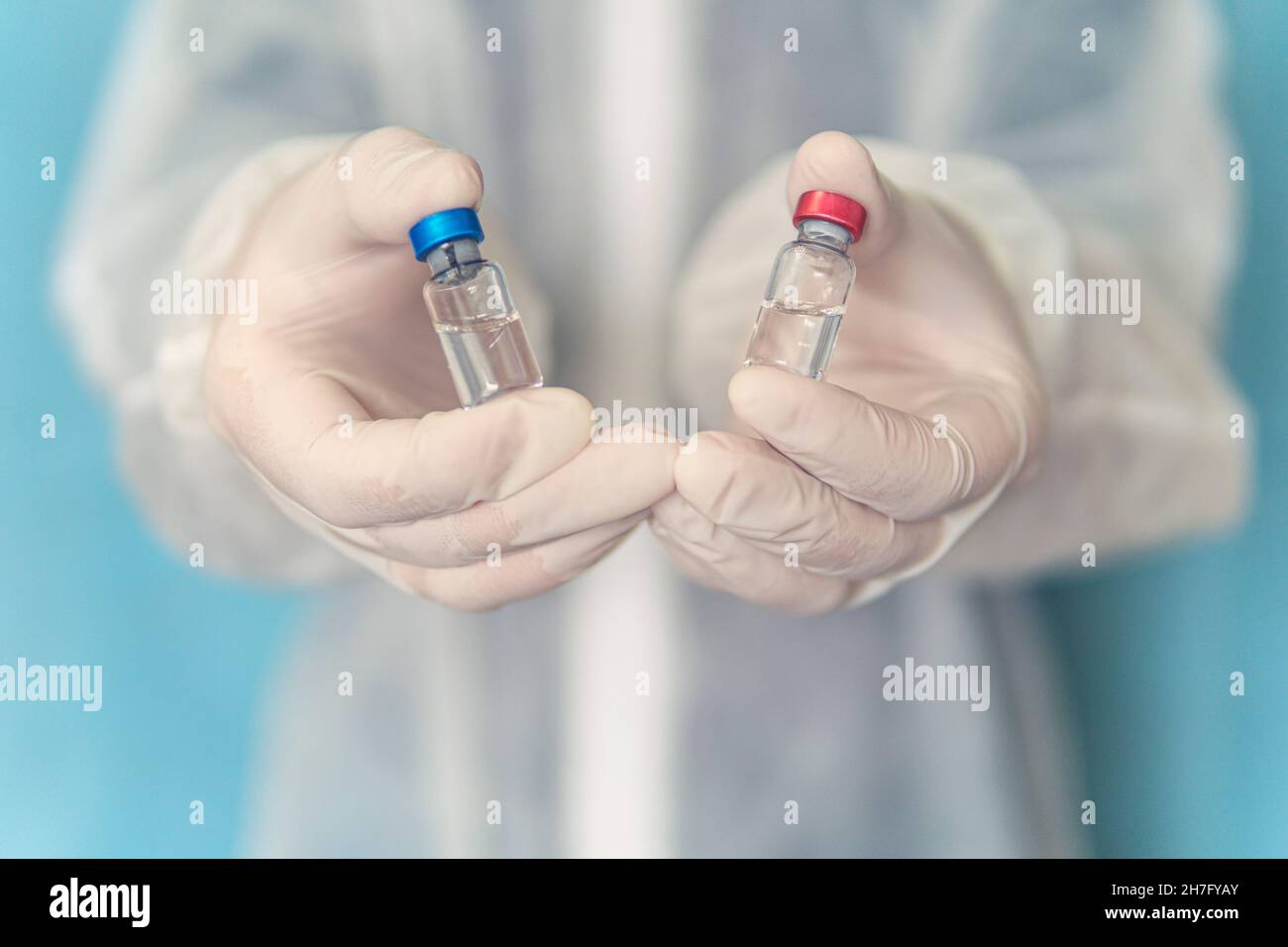 Choisir le meilleur vaccin pour la vaccination fabriqué aux États-Unis ou dans l'UE ou en chinois ou en russe.La conception médicale de la lutte contre la pandémie de Covid-19 Banque D'Images