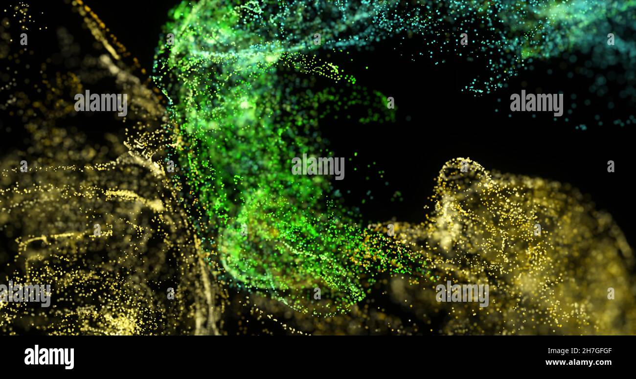 Image de nuages de particules verts et jaunes se déplaçant sur fond noir Banque D'Images